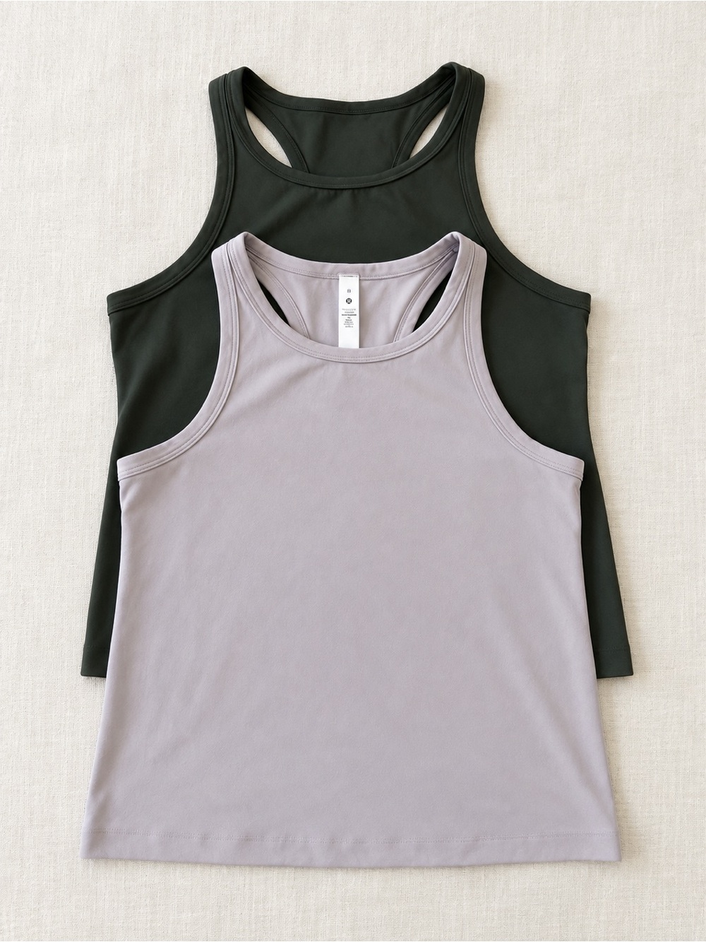 Lot of 2 women’s Racerback Tanks - lavender and dark green